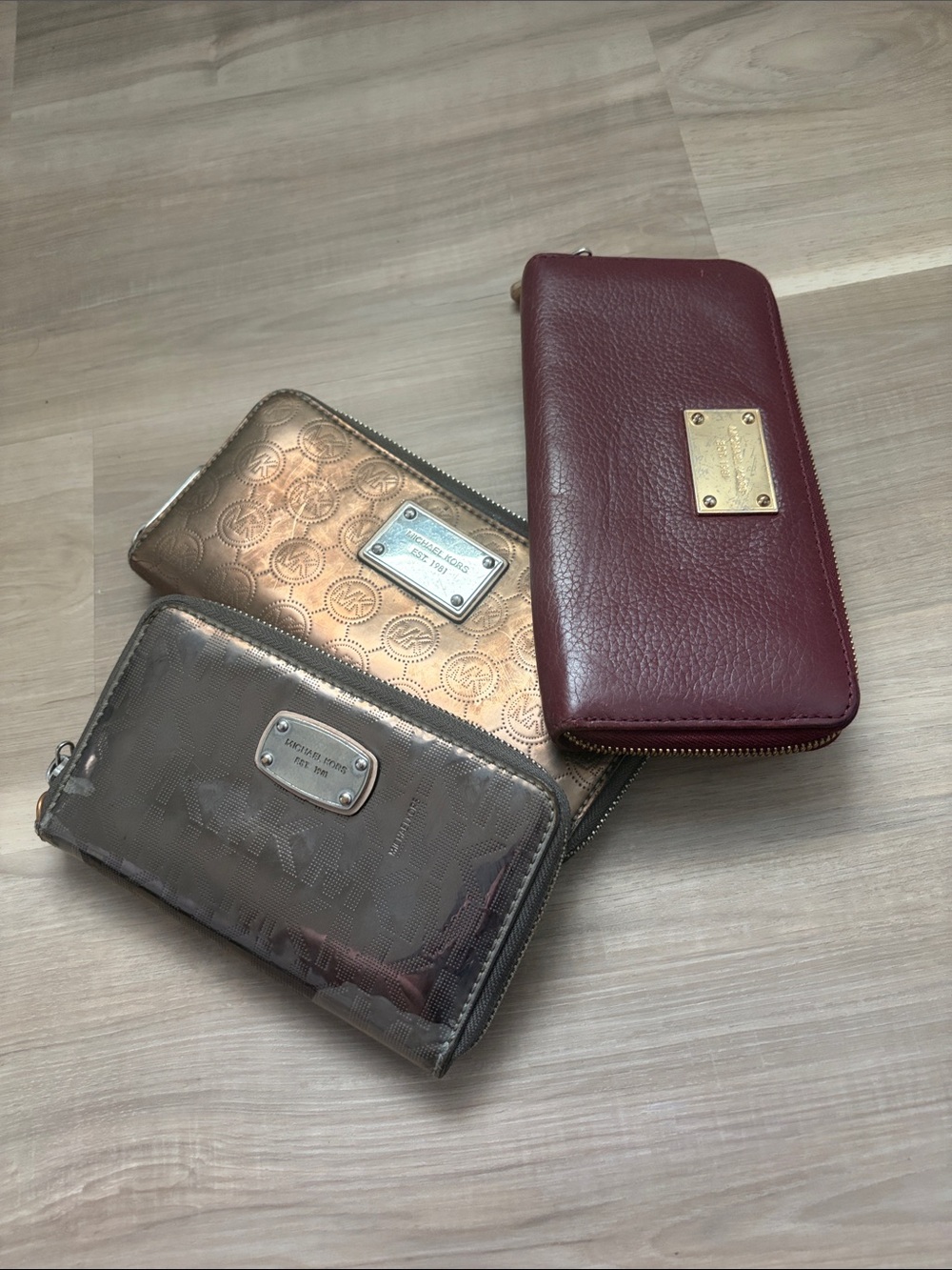 Michael Kors Wallet Trio in Burgundy, Rose Gold, Silver